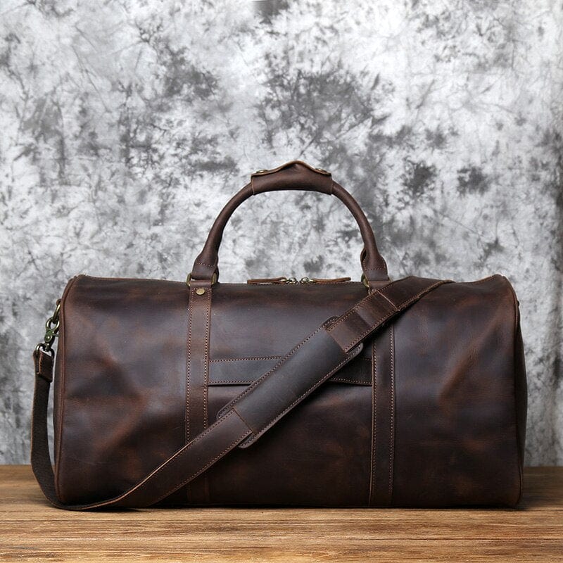 Sac de voyage rectangulaire en cuir patiné avec sangle ajustable