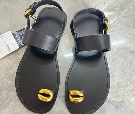 sandales-minimalistes-noires-cauri-dore