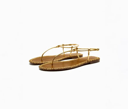 sandales-plates-dorees-lanieres-ajustables